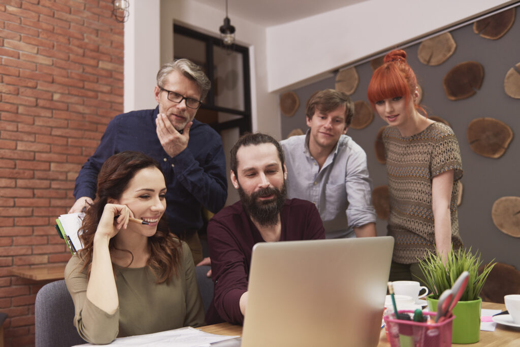 Website Maintenance Cost: How Much Should You Budget? 3 Group of business team working