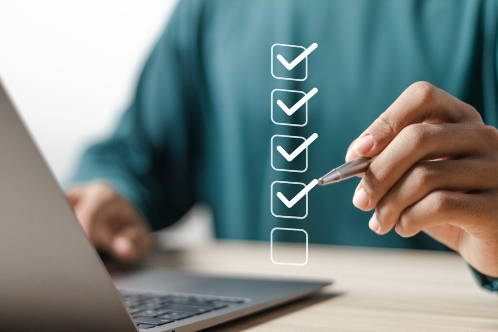 Invest in Us Landing Page Design: Complete Guide for Agencies 2 Checklist concept. Businessman making a corporate survey checklist. Complete checklists, digital forms, questionnaires, assessments, online surveys.
