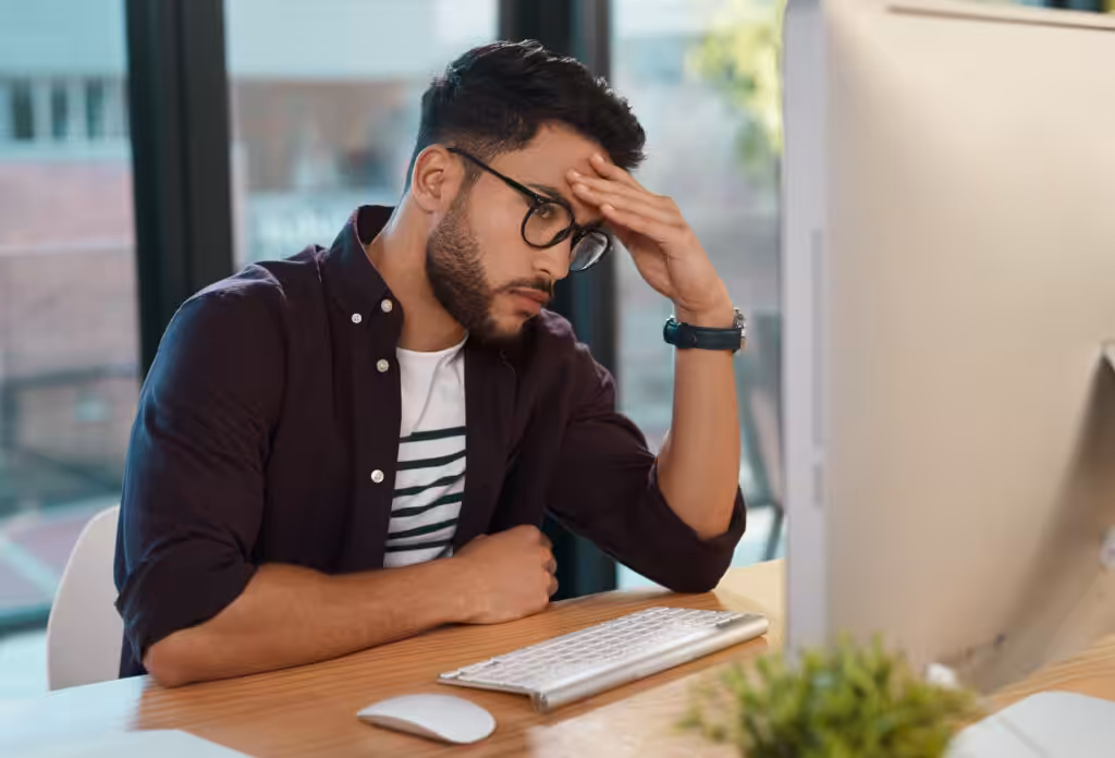 Invest in us landing page design: Complete guide for agencies 3 computer-copywriter-man-with-headache-frustrated-burnout-office-stressed-tired-creative-person-technology-online-digital-website-deadline-due-date-project