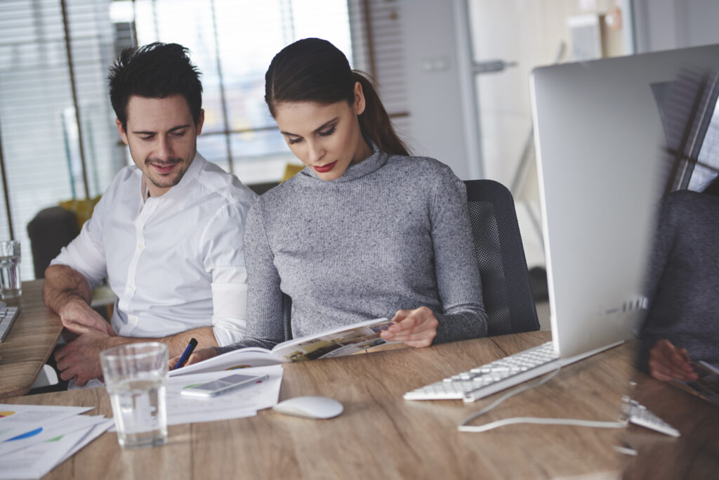 Two colleagues searching for new inspirations