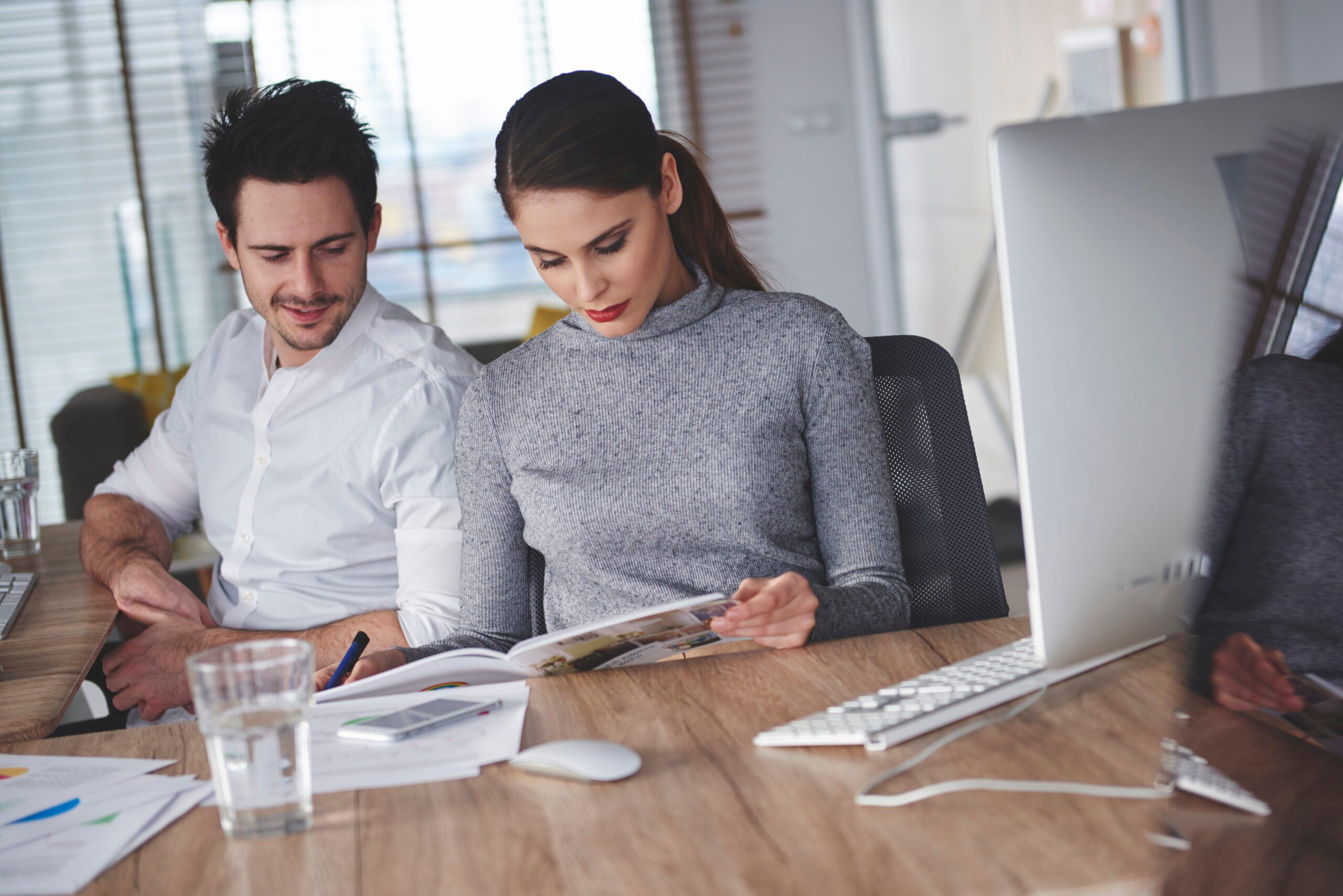 Two colleagues searching for new inspirations