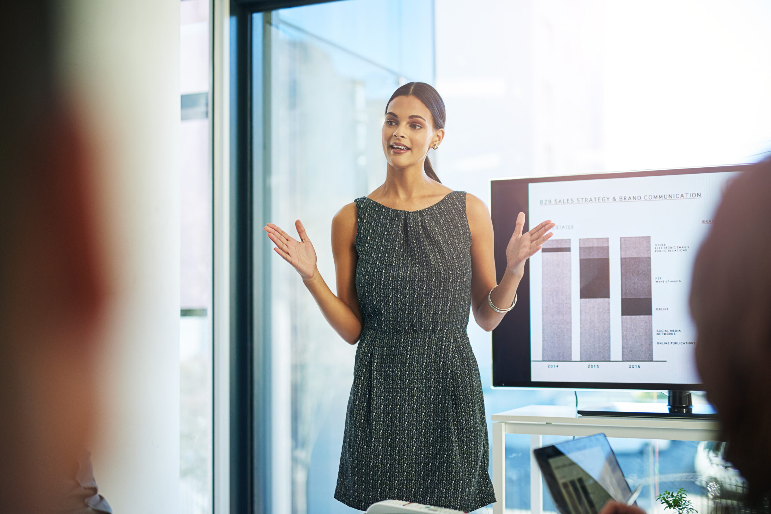 woman-boardroom-graphs-screen-presentation-report-feedback-as-finance-analyst-business-clients-people-meeting-financial-solution-company-growth-statistics-results